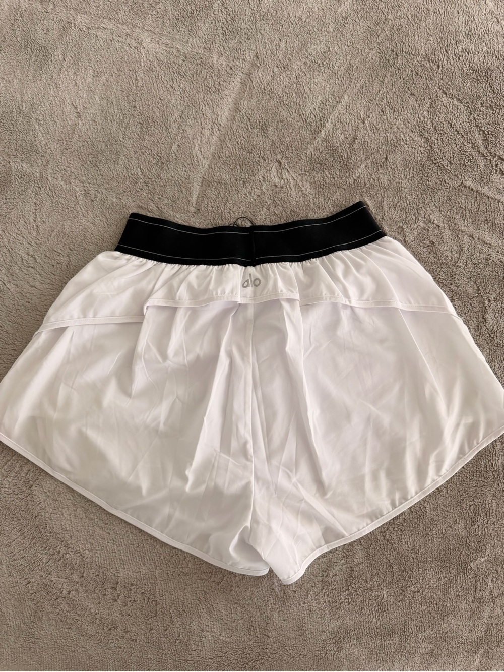 ALO Yoga White Athletic Shorts with Black Elastic Waistband - Picture 2 of 2